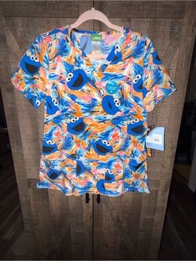 Tooniforms Women's Blue Cookie Monster Print Scrub Top